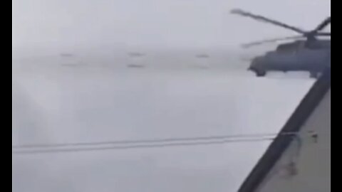 RUSSIAN MI-24P HELICOPTER FIRING MISSILES OUTSIDE KYIV, Ukraine