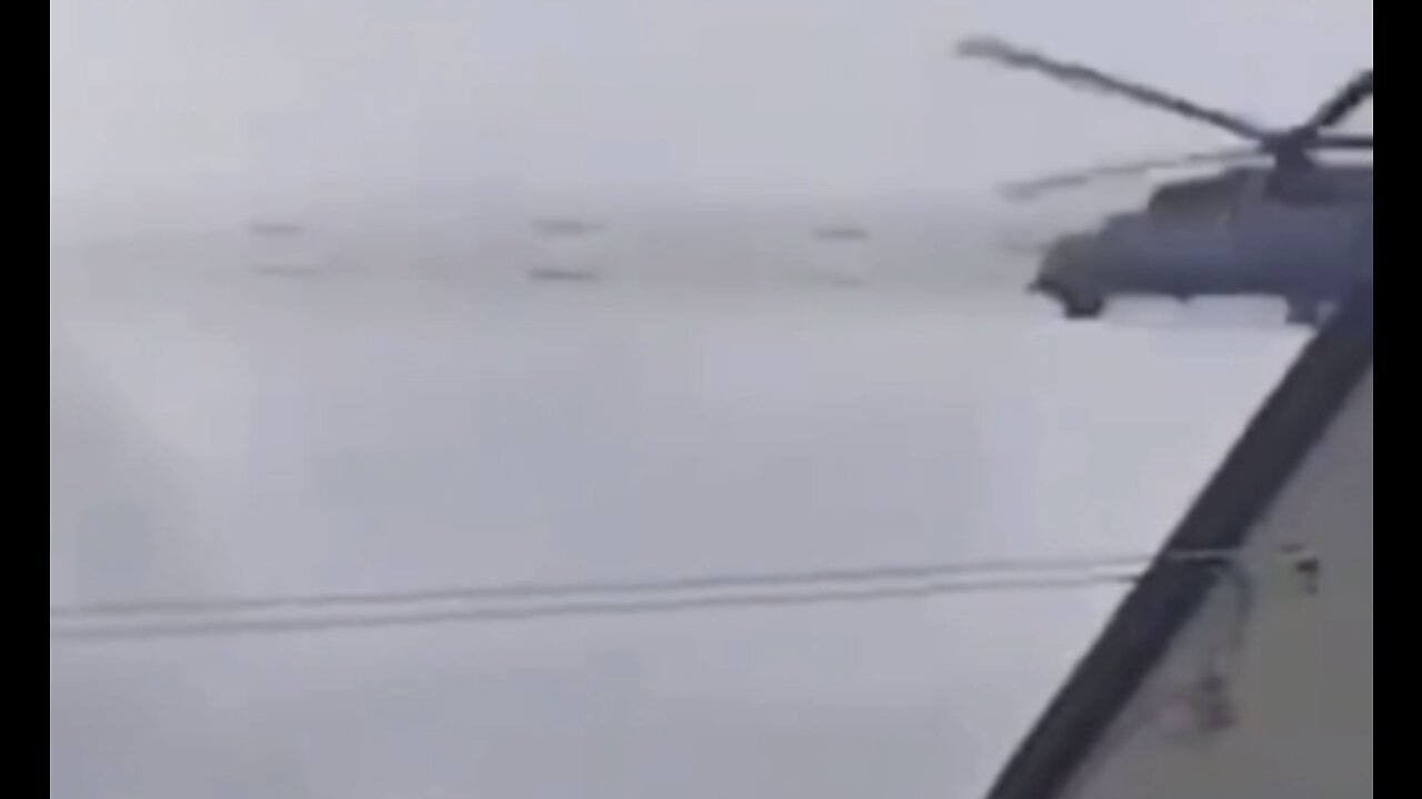RUSSIAN MI-24P HELICOPTER FIRING MISSILES OUTSIDE KYIV, Ukraine