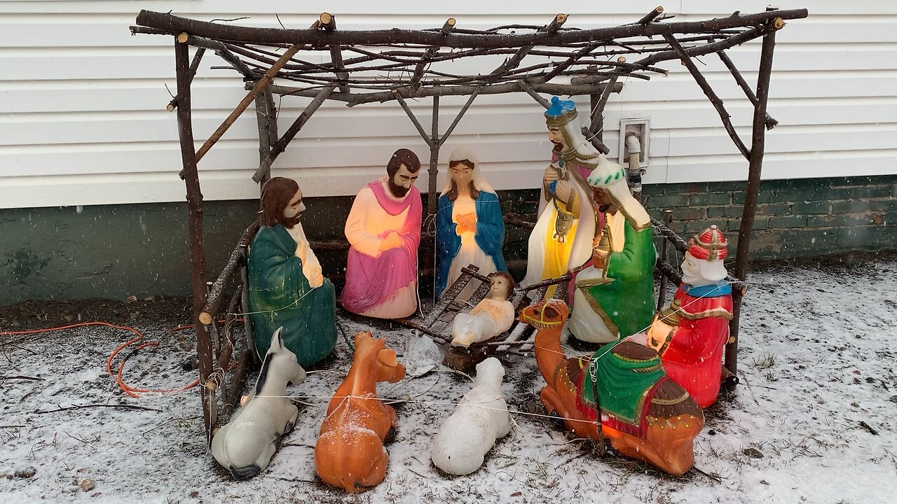 Snow falling on the Nativity