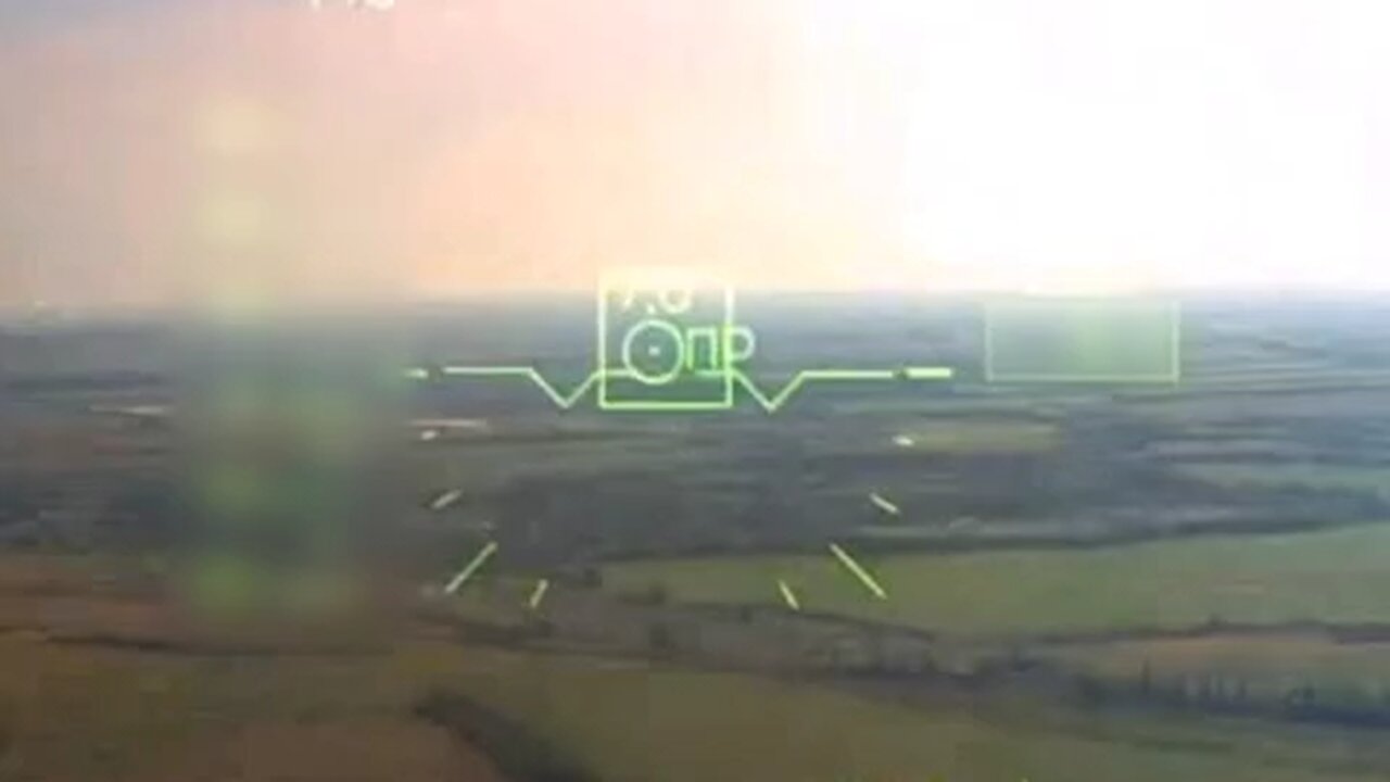 A Russian Ka-52 attack helicopter shoots a Vikhr-M anti-tank missiles destroying an armored vehicle