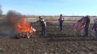 American Legion veterans retire American flags on Veterans Day