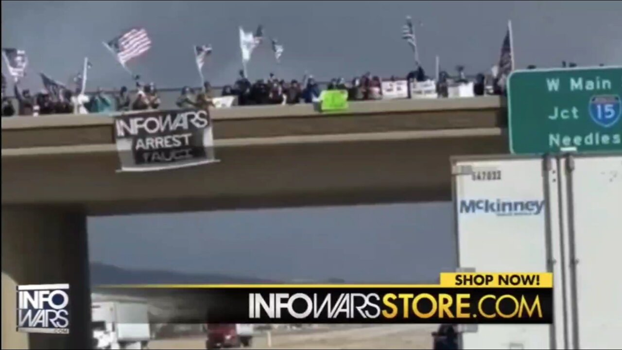 Infowars Flag Waves At U.S. Freedom Convoy Heads to D.C.