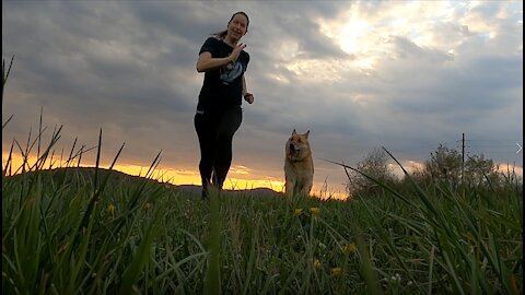 women run with his dog