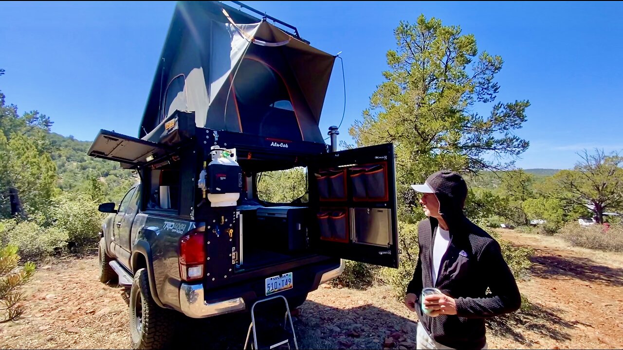 TACOMA CAMPER w/ FIREPLACE, WATER STORAGE, QUEEN SIZED BED (DROP DOWN), ETC - FULL-TIME RIG!