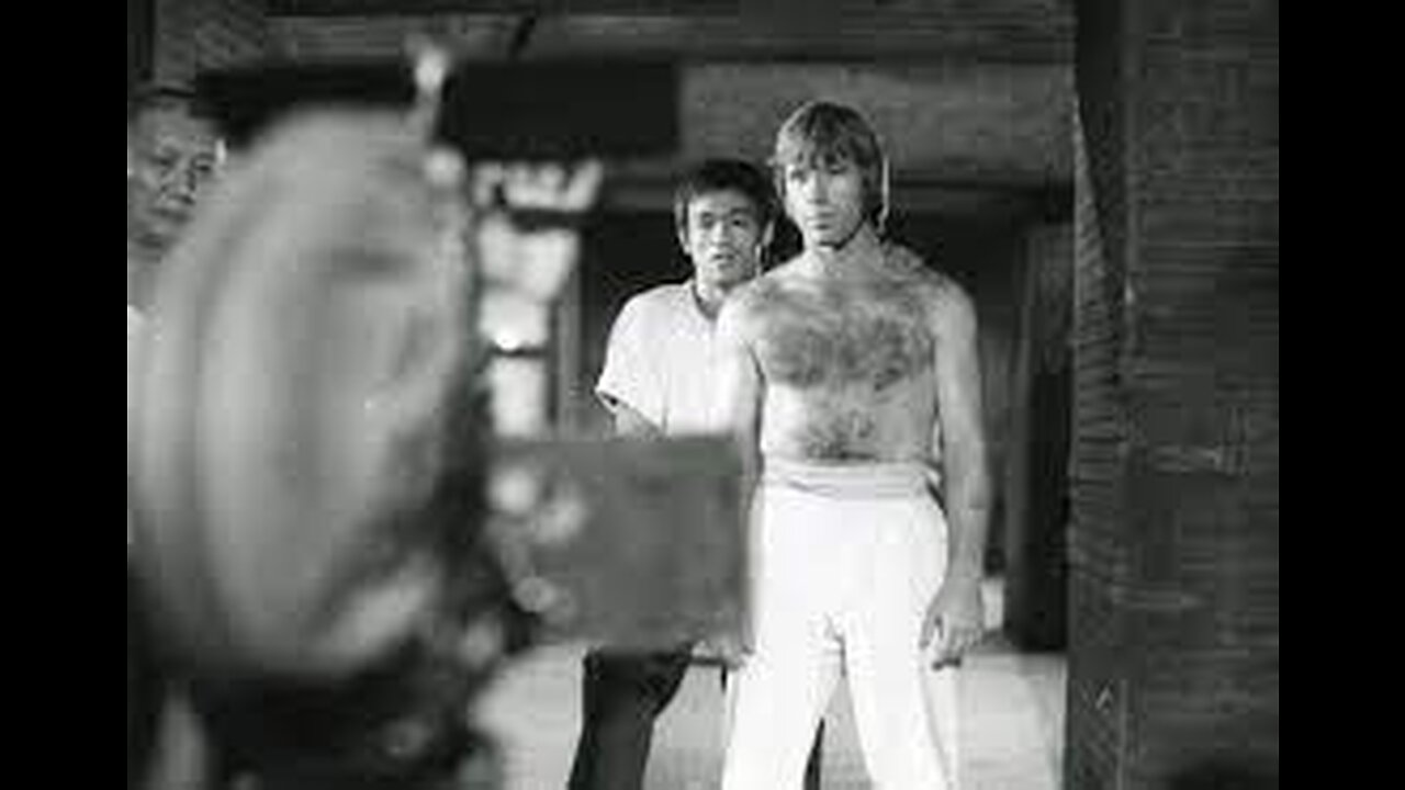 Cross kick Studio Films Bruce Lee and chuck Norris way of the Dragon in front of camera