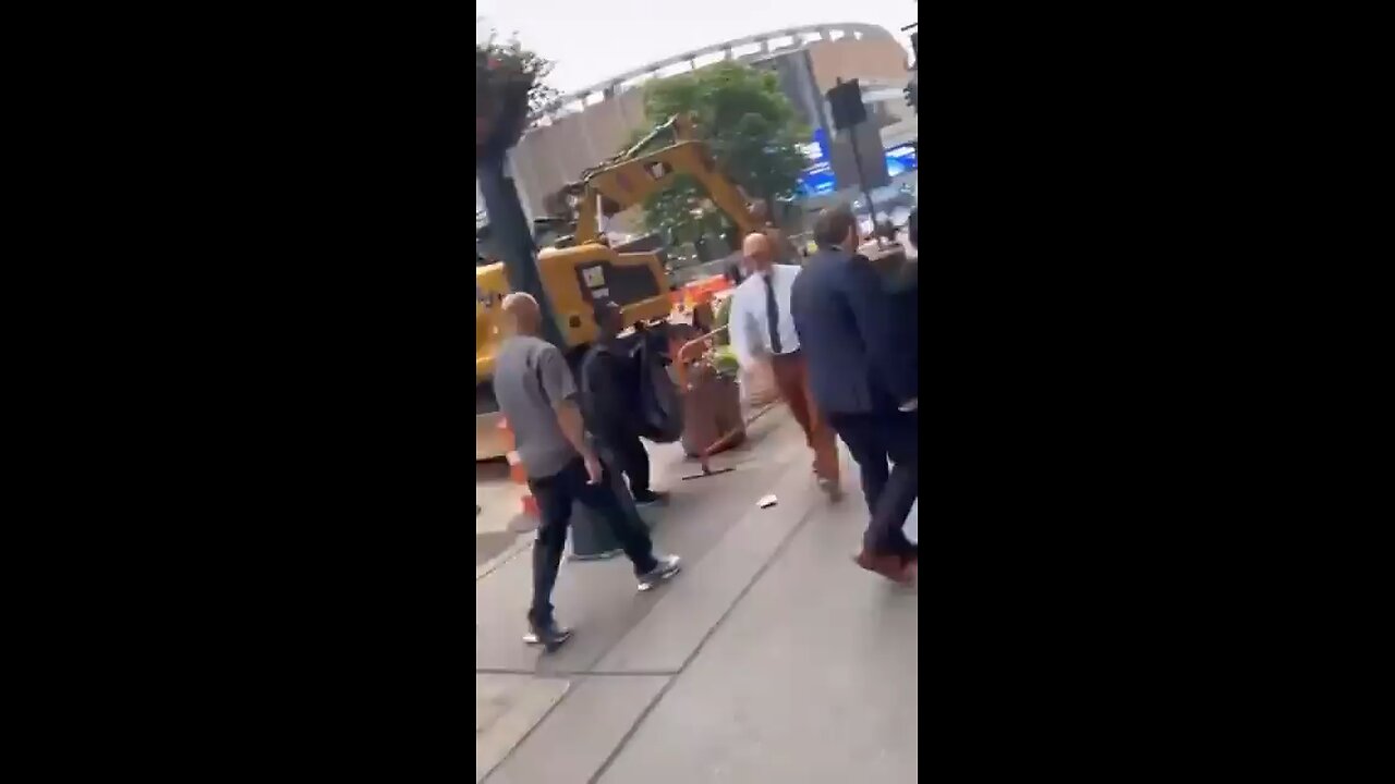 Suit-Wearing Man Attacks Homeless Man, Gets Instant Karma