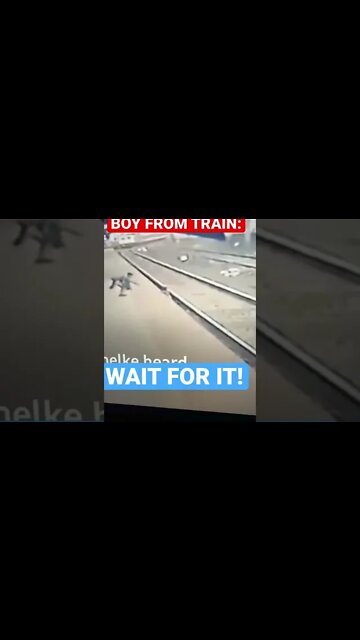 MAN SAVES BOY FROM TRAIN IN LAST MOMENT !!!