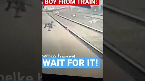 MAN SAVES BOY FROM TRAIN IN LAST MOMENT !!!