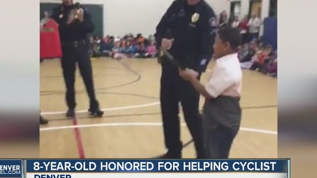 Local child called hero by Aurora Police, given award