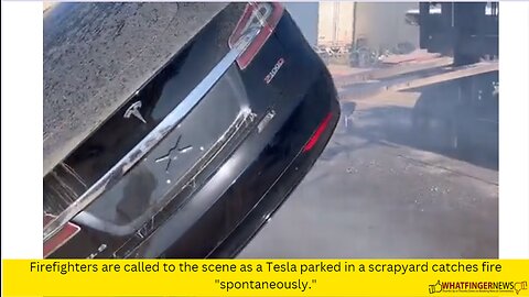 Firefighters are called to the scene as a Tesla parked in a scrapyard catches fire "spontaneously."