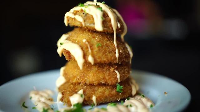 At The Table: Burger inside onion rings