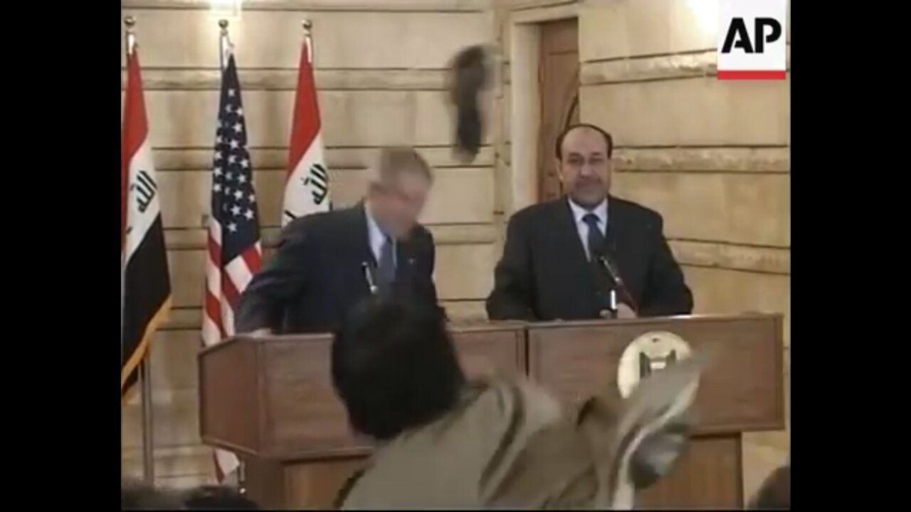BUSH Has Shoes Thrown at Him During Presser (LOL)