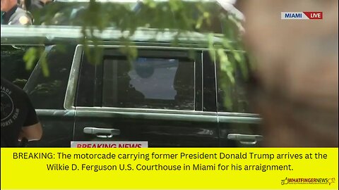 BREAKING: The motorcade carrying former President Donald Trump arrives at the Wilkie D.