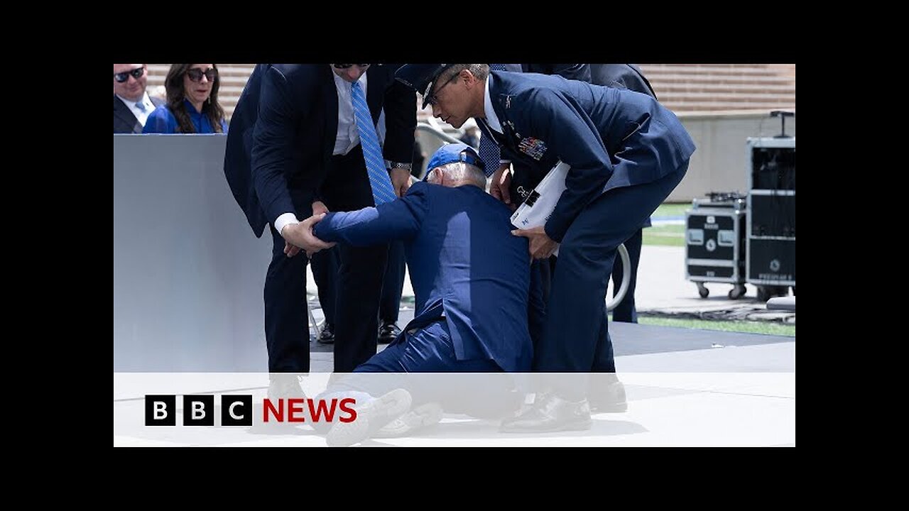 US President Biden trips and falls over at graduation event – BBC News