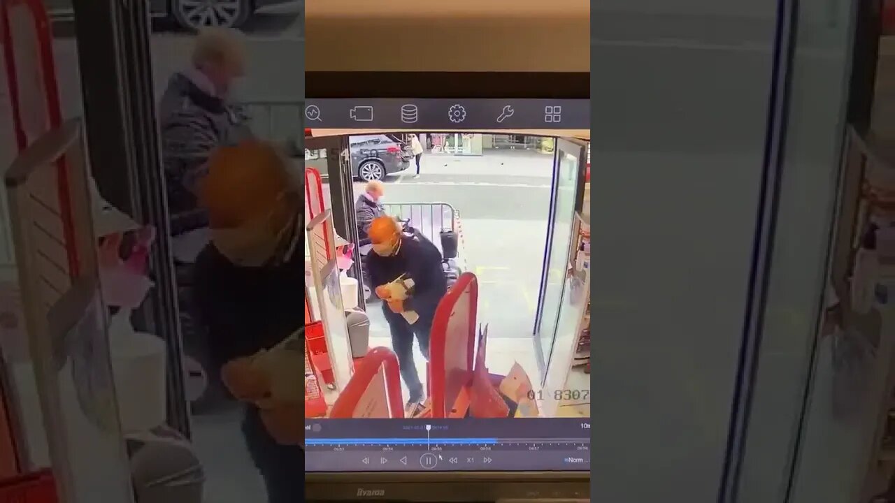 Man On Mobility Scooter Takes Shop Display Along For A Ride