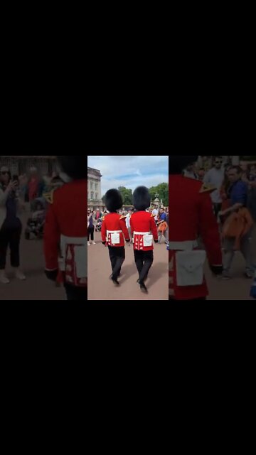 Make way. woman gets squashed between two guards of the queens guards #buckinghampalace