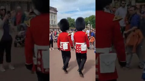 Make way. woman gets squashed between two guards of the queens guards #buckinghampalace