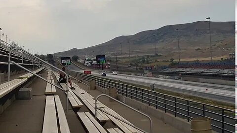 Tesla Model 3 stealth vs CTS V Blue stands Bandimere