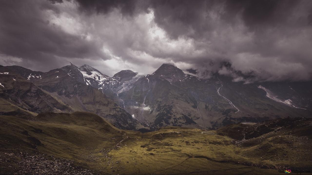 "The Majestic Movement of Clouds Across Mountains"