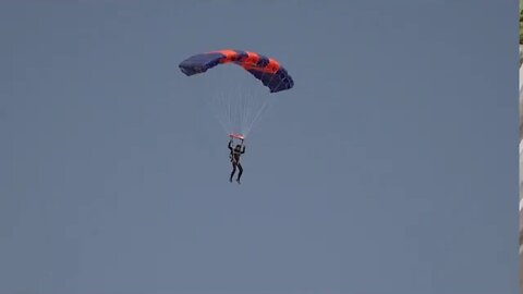 SKYDIVER UNDER BLUE JONDER