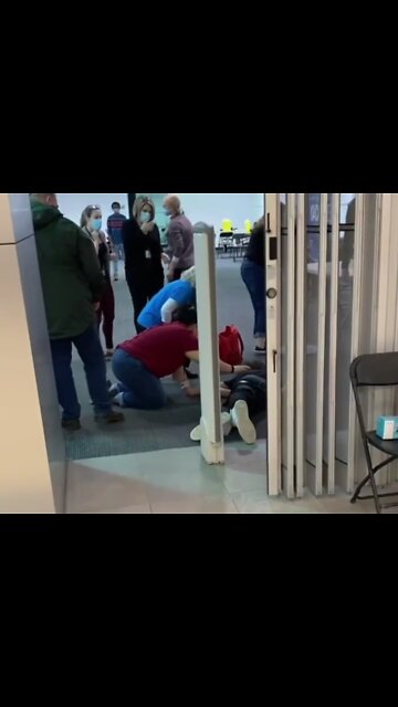 Adult male collapses leaving vaccine clinic.