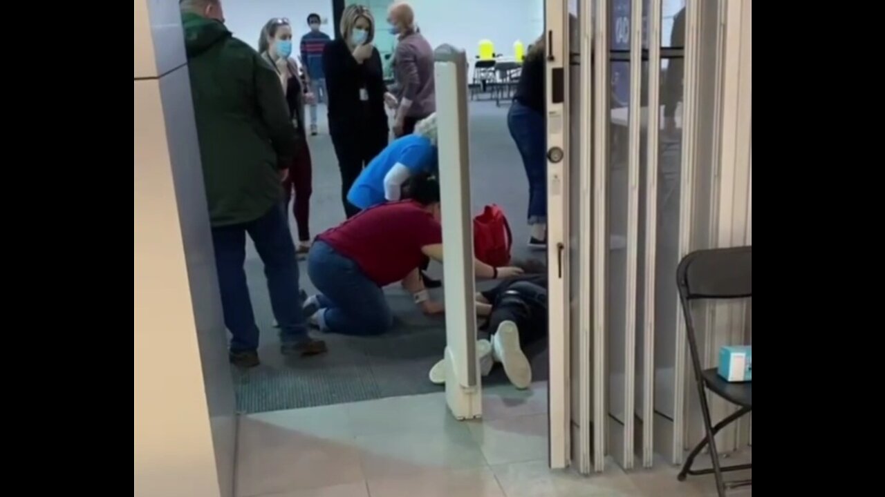 Adult male collapses leaving vaccine clinic.