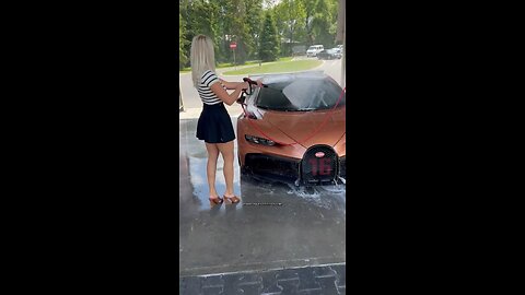 Mystery Woman Washing Andrew Tate’s Bugatti