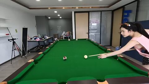 Asian Girls Playing Snooker