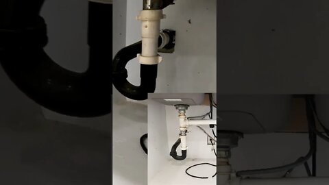 Some type of DIY kitchen sink drain pipe contraption. #shortvideo