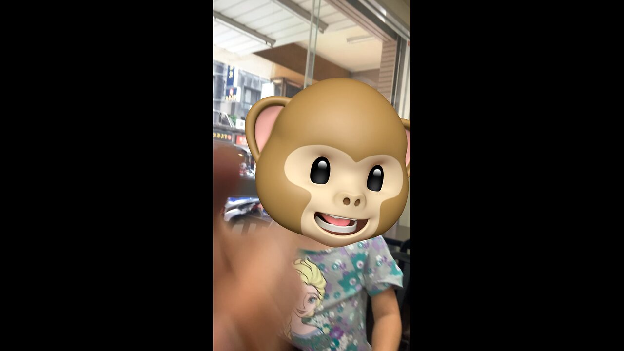 Toddler playing with face filters