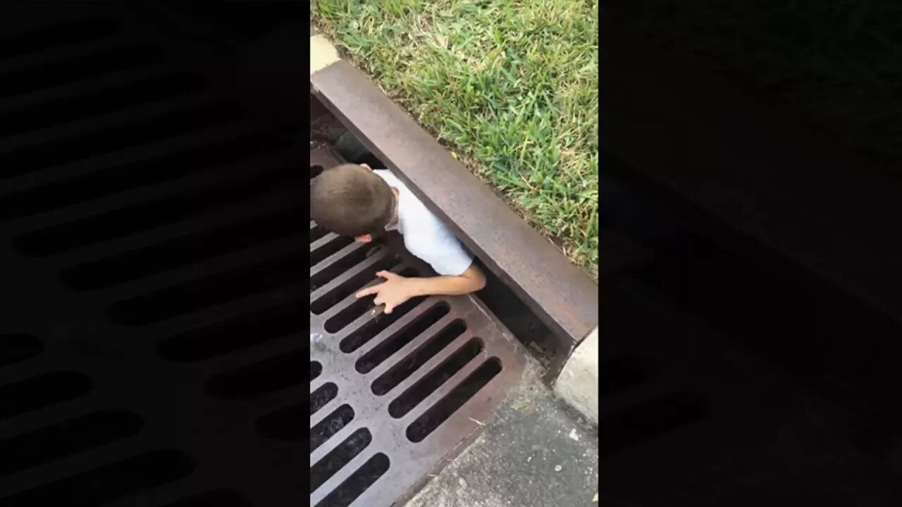 kid gets stuck in sewer..