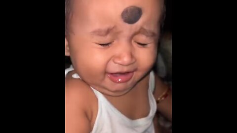 cute baby eating juice lemon