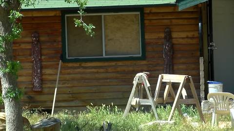 911 call: neighbor attempts to assault neighbor and set his house on fire