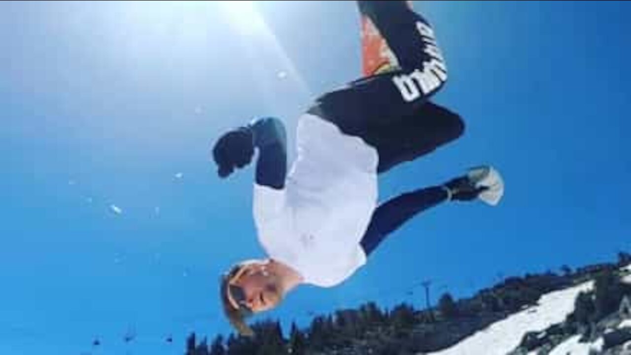 Snowboarder does double somersault but lands wrong