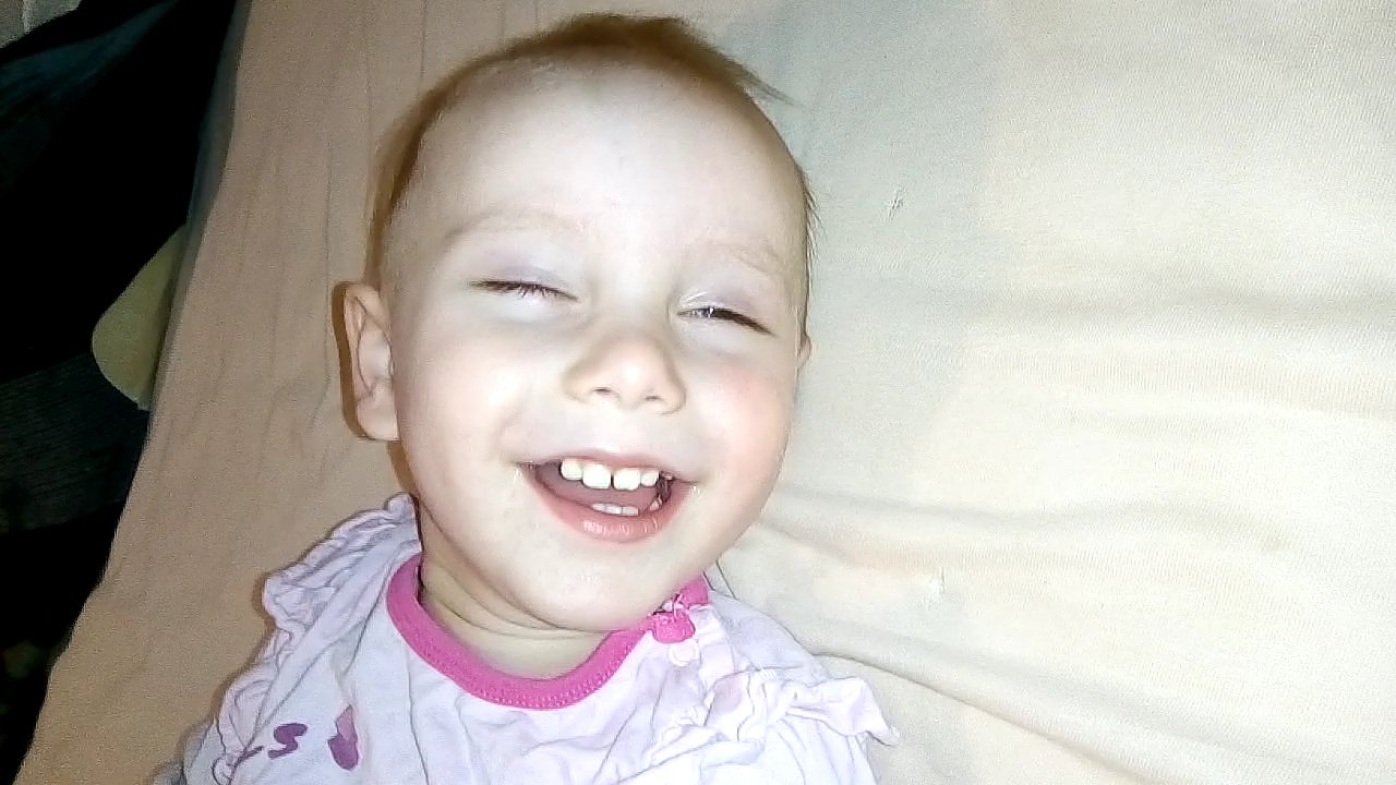 The baby is tickled to Wake up