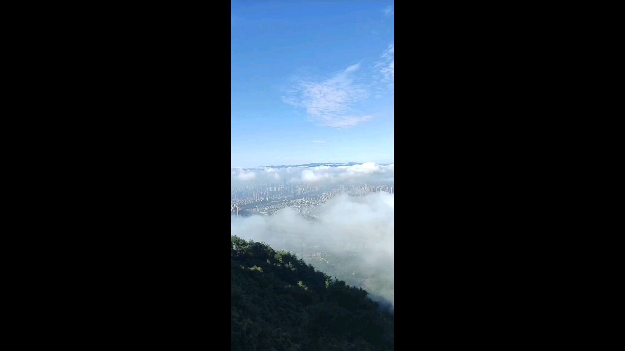 Above The Clouds City View