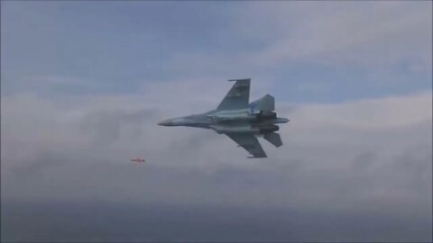 SU 27 follows and chases down a cruise missile somewhere over Russian waters.