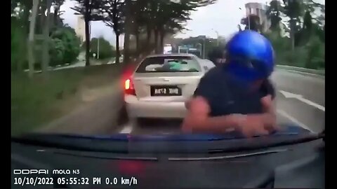 Motorcycle biker having a bad day.