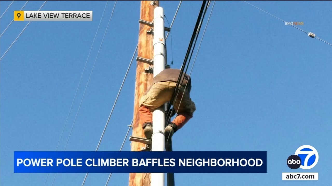 Man refuses to climb down power pole in Lake View Terrace