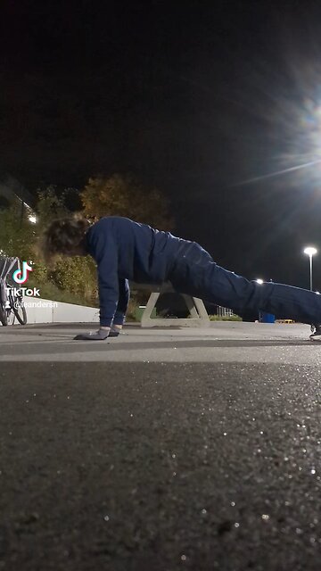 Doing spiderman pushups