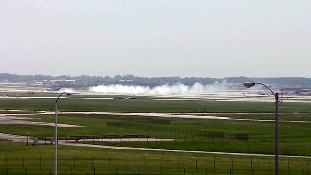 All flights temporarily delayed at MKE airport after military plane makes emergency landing