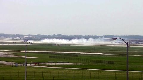 All flights temporarily delayed at MKE airport after military plane makes emergency landing