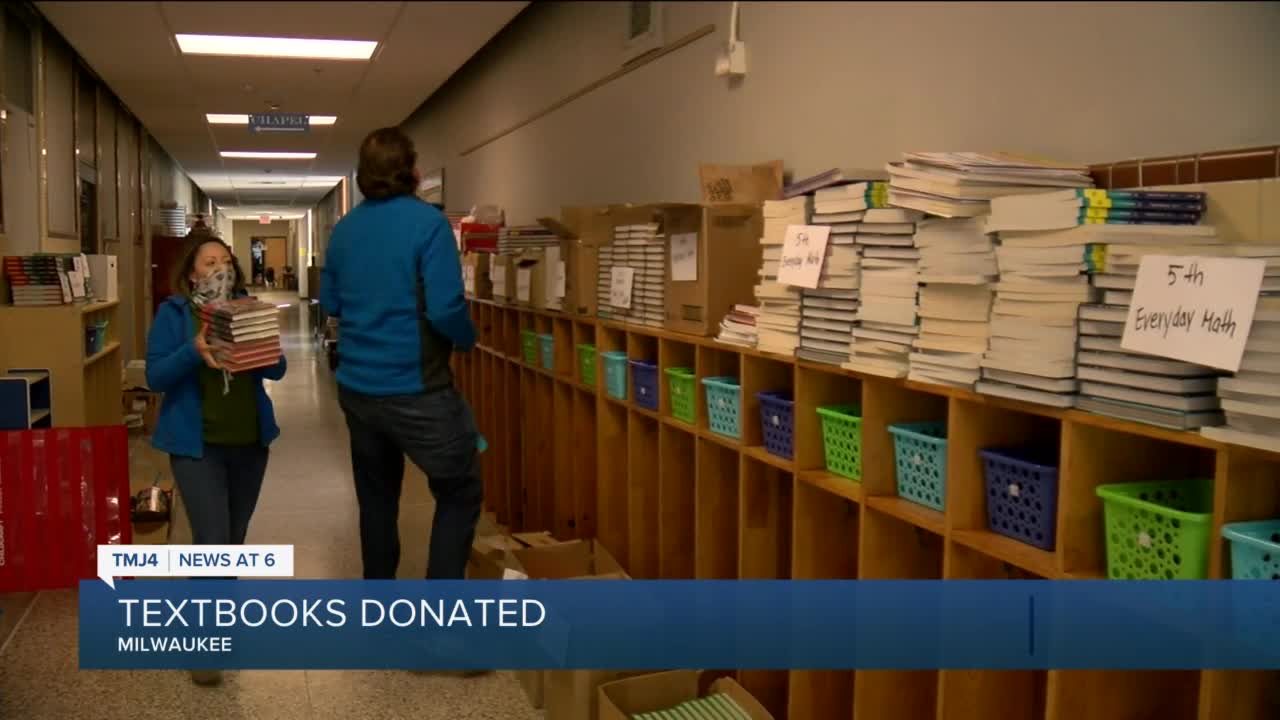 St. Joseph Academy donates books to Rotary Club of Milwaukee