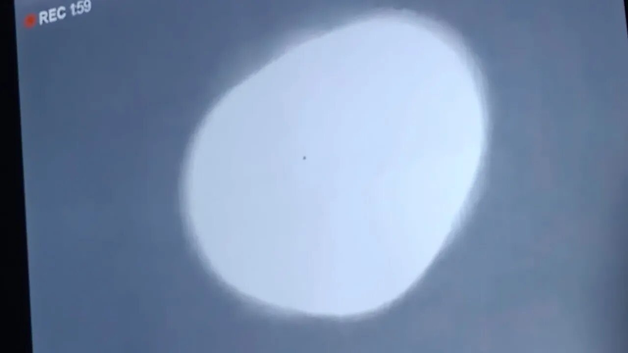 Very Close Reflective Object Flys Slowly Towards me