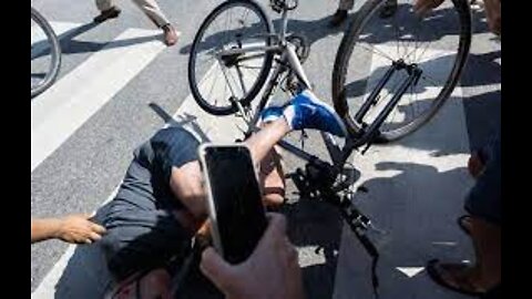 President Joe Biden falls off bike