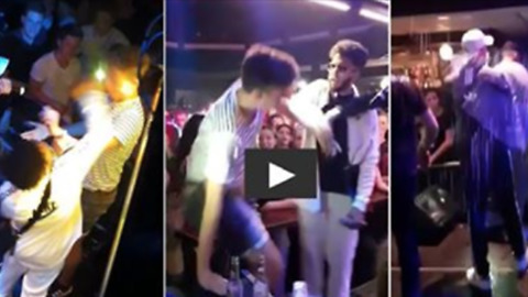 Dutch rapper gets a beer shower on stage and then...