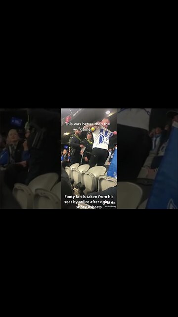 Footy fan is taken from his seat by police after doing a shoey #shorts