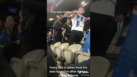 Footy fan is taken from his seat by police after doing a shoey #shorts