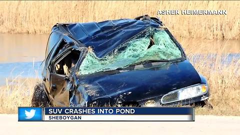 SUV crashes into pond in Sheboygan, driver ejected from vehicle