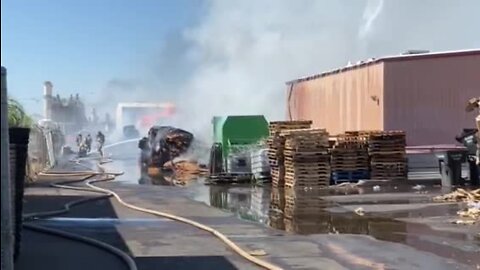 Cactus Container spars in flames in west phoenix